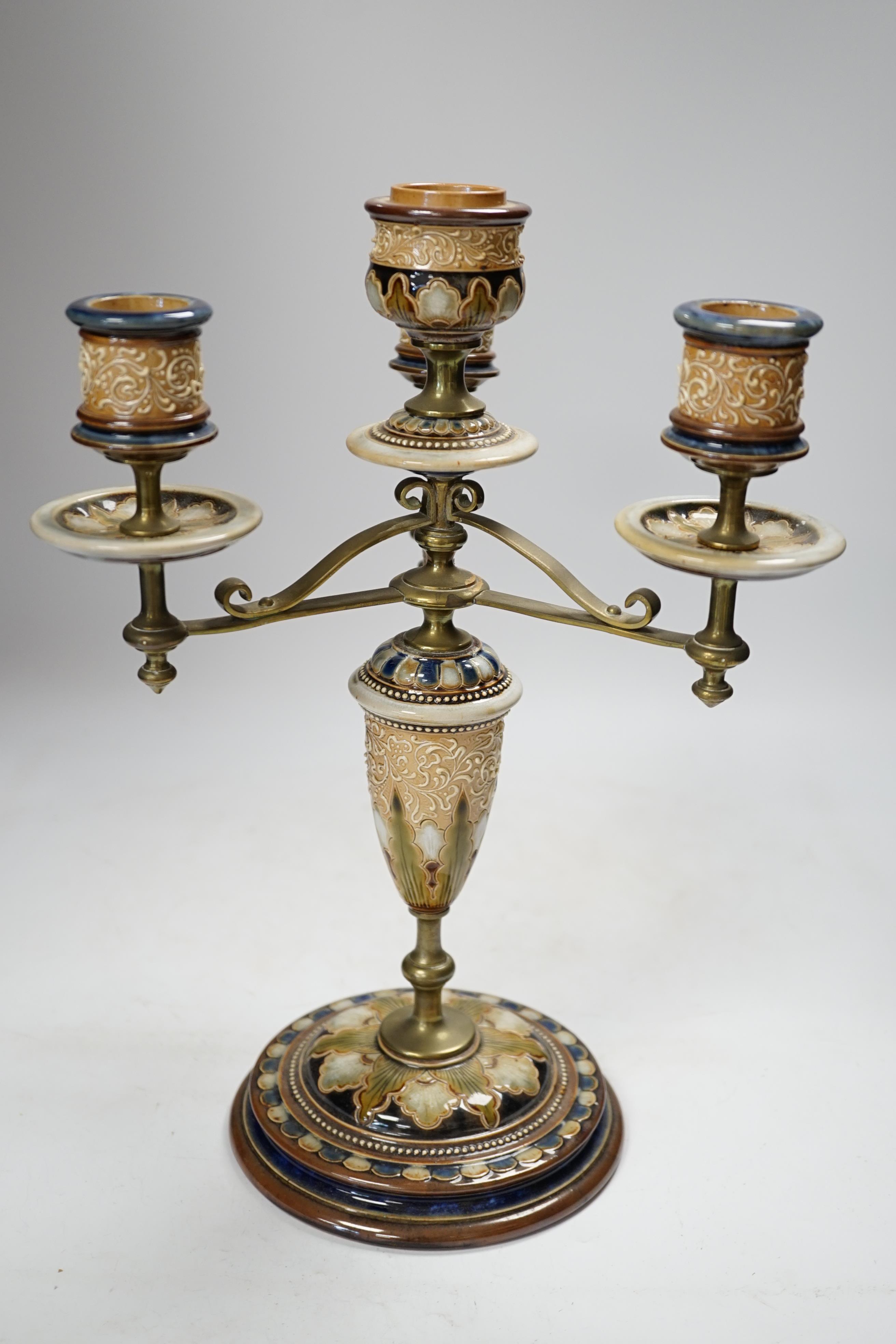 A Royal Doulton three branch four light candelabra, Eliza Simmance, 33cm high, Condition - poor to fair, one arm restored